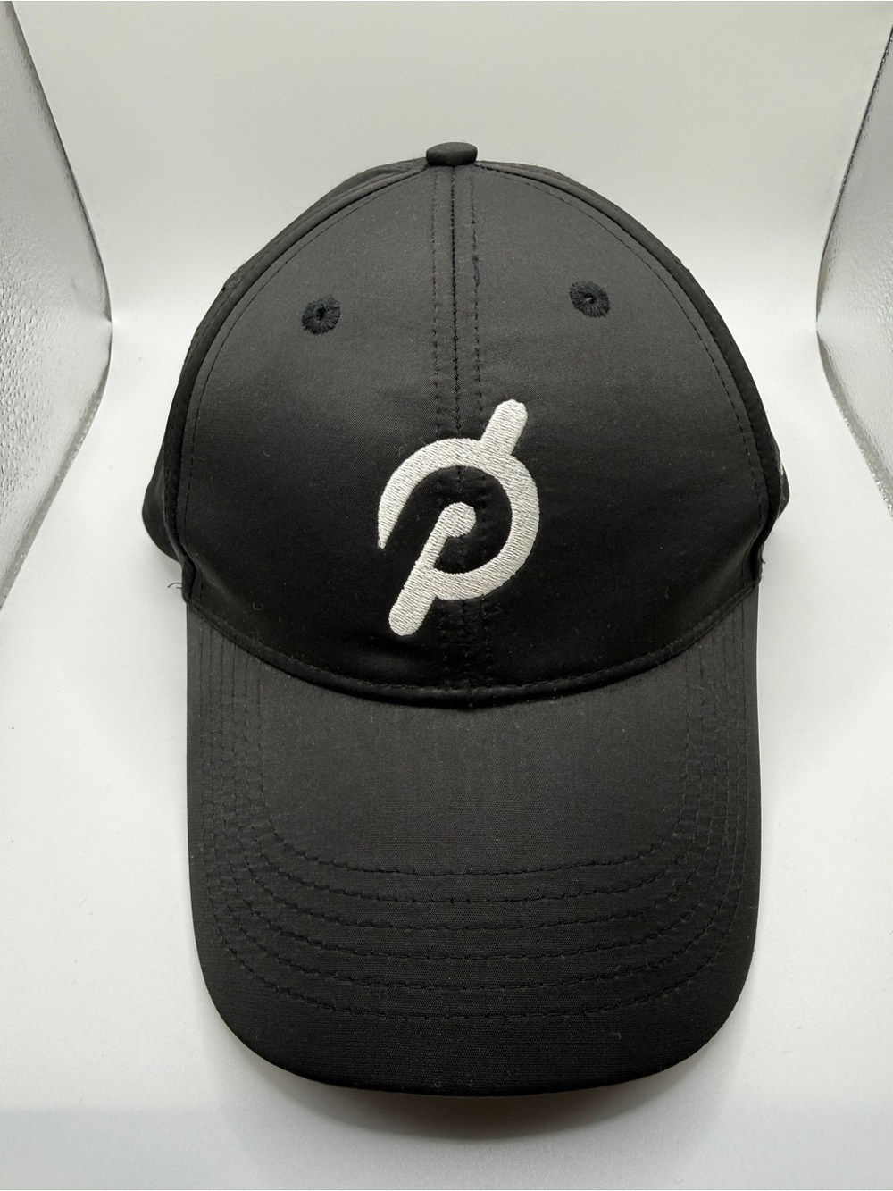 Peloton Black Logo Performance Baseball Cap
